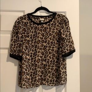 Never worn, leopard semi sheer blouse
